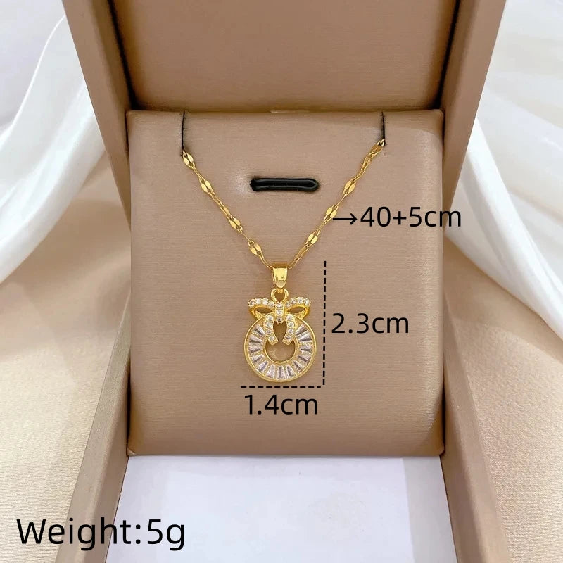 Butterfly Bow Pendant Necklace | Gold Stainless Steel | Nixie Pendant Necklace Nixie XL2606-453