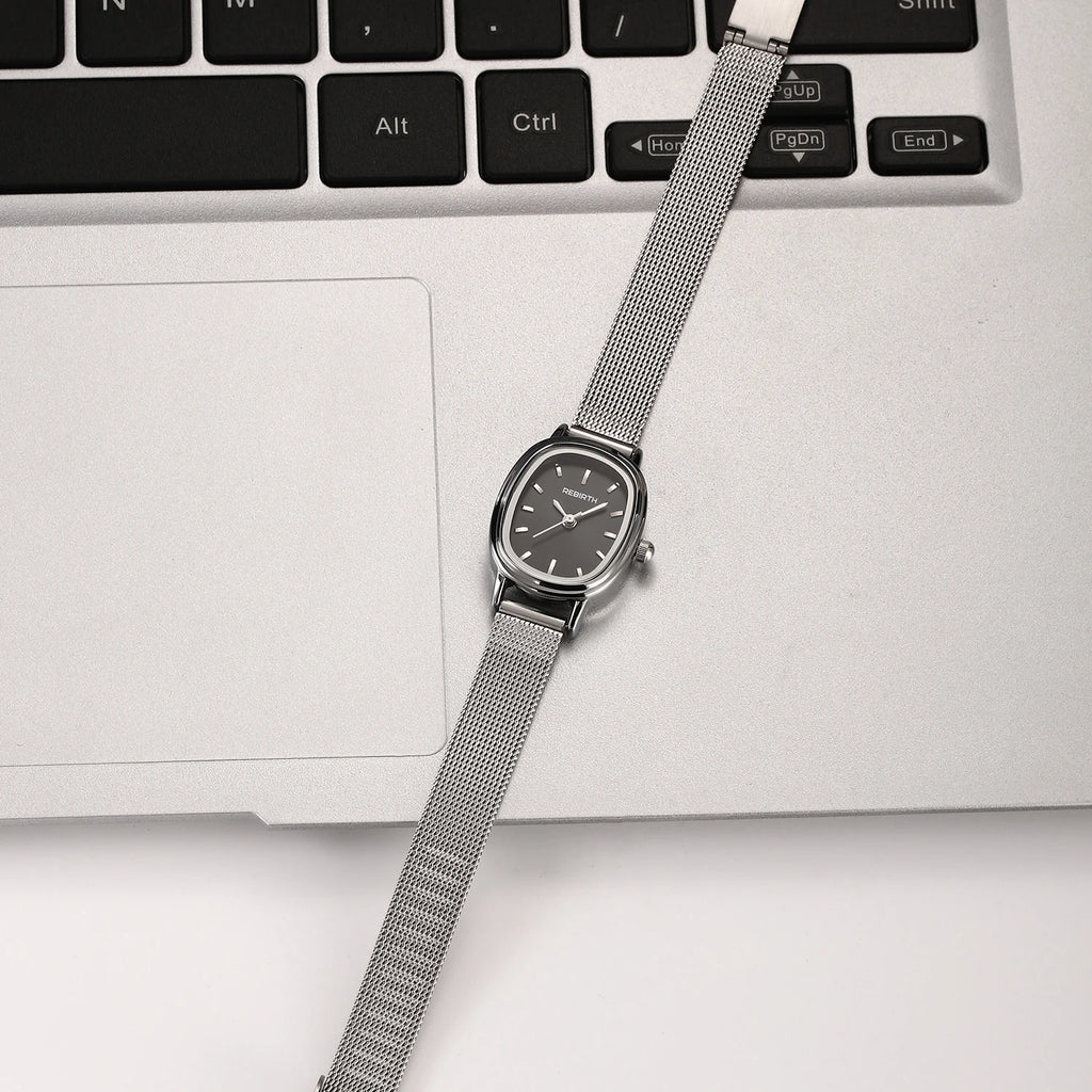 Retro Oval Silver Quartz Watch – Milanese Mesh Strap for Women Women's Quartz Watch Nixie