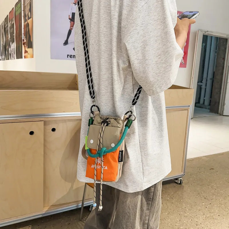 Color-Block Nylon Drawstring Crossbody Bag | Water Bottle Pocket