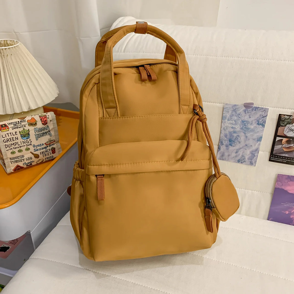 Nixie Lightweight Nylon Backpack – Laptop, Travel & Commute Lightweight Backpack Nixie Yellow