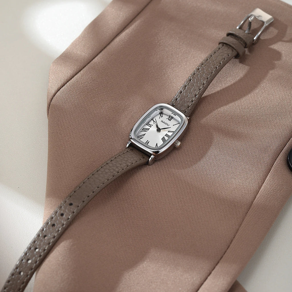 Women's Leather Strap Quartz Watch – Roman Numeral Casual Style Women's Quartz Watch Nixie