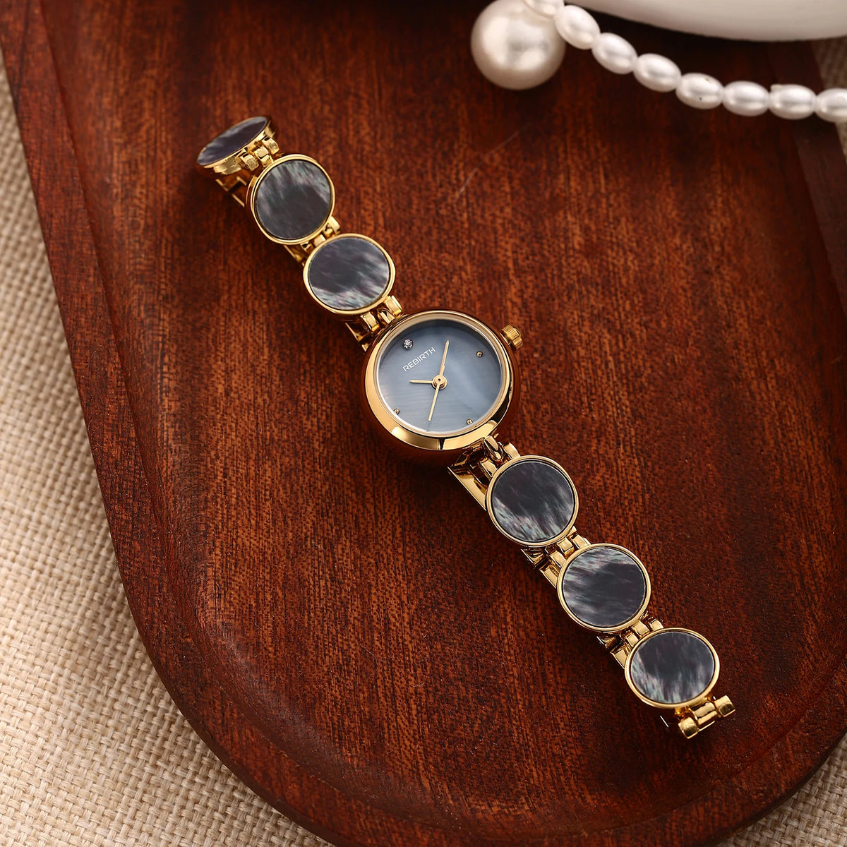 REBIRTH Women's Quartz Watch | Mother-of-Pearl & Diamond Dial Women's Quartz Watch Nixie