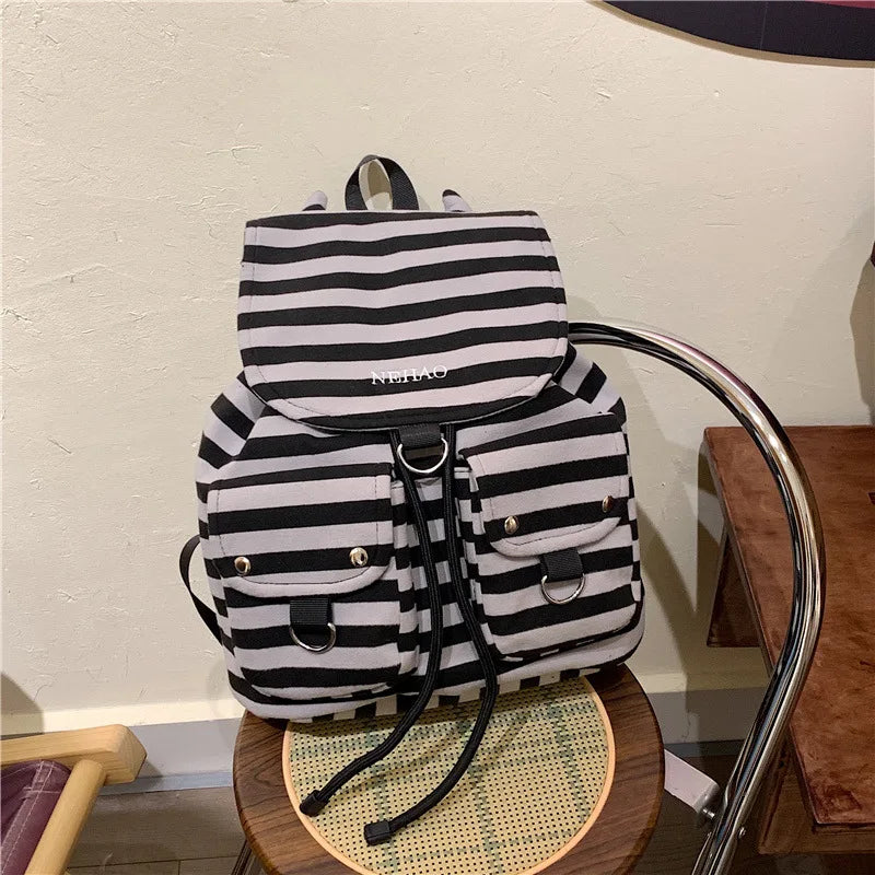 Korean Striped Canvas Drawstring Backpack – Casual School Travel Bag Canvas Drawstring Backpack Nixie Black