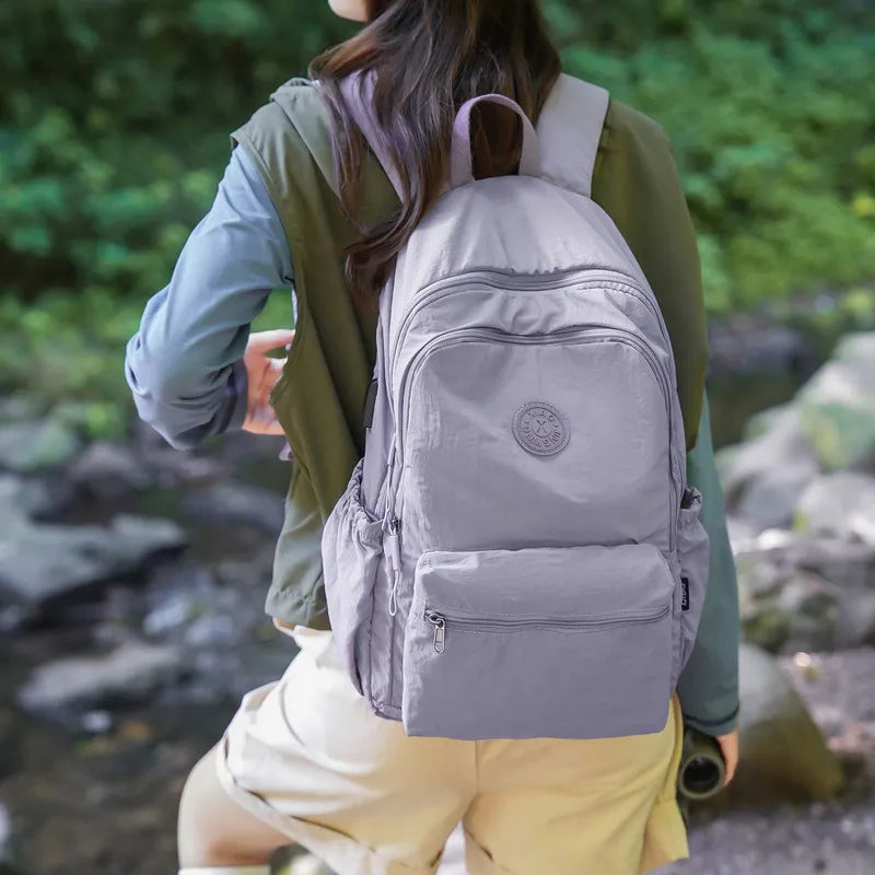 Nixie Lightweight Waterproof Travel Backpack – Unisex 20–35L