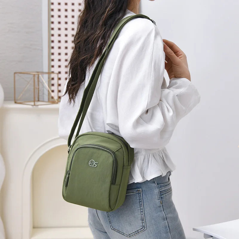 Nixie Women's Mini Crossbody Bag – Lightweight Oxford Canvas Crossbody Shoulder Bag Nixie