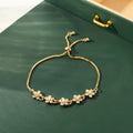 Crystal Flower Cubic Zirconia Butterfly Bracelet – Gold Bangle Fashion Bracelet Nixie BR20Y0183