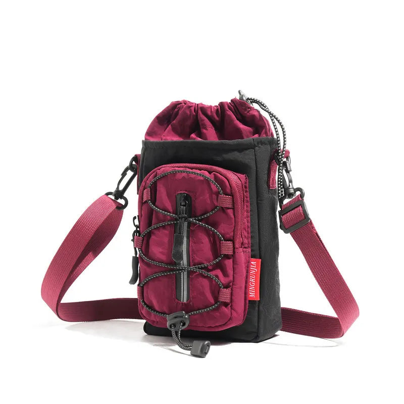 Nixie Outdoor Crossbody Bag – Water Bottle & Phone Holder Crossbody Bag Nixie