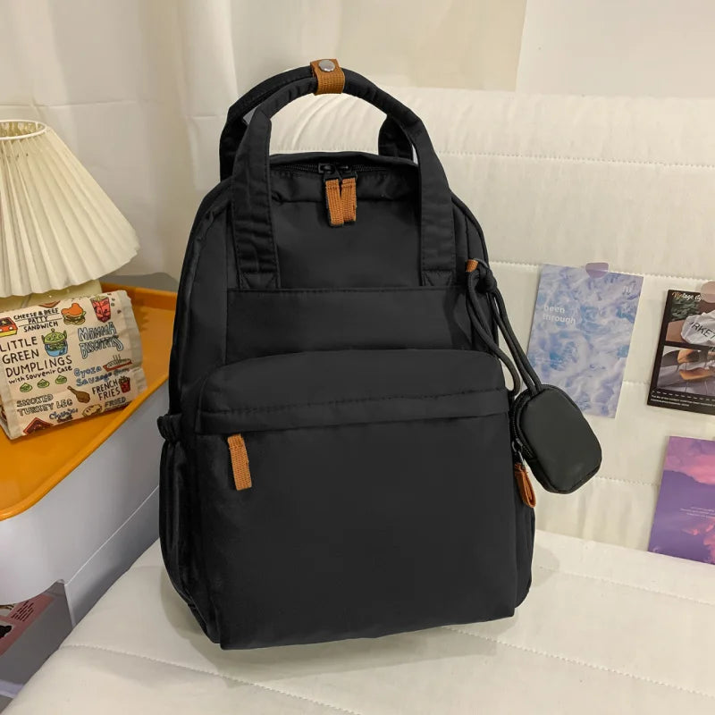 Nixie Lightweight Nylon Backpack – Laptop, Travel & Commute Lightweight Backpack Nixie