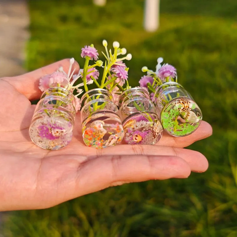 4-Pack Glow in the Dark Mini Glass Vases with Artificial Flowers Decorative Vase Set Nixie