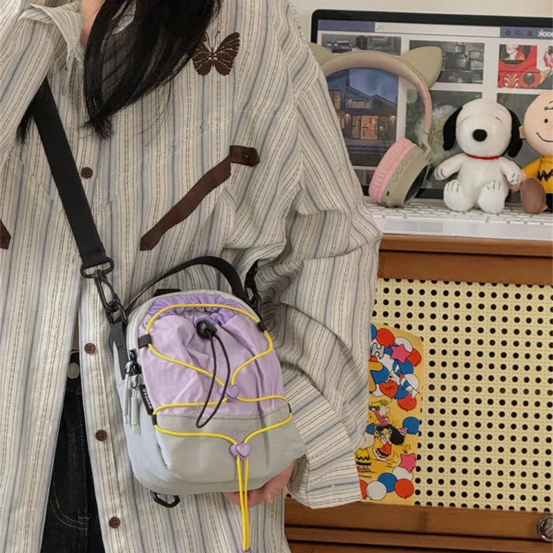 Nixie Color-Block Crossbody Bucket Bag – Waterproof Nylon Crossbody Bucket Bag Nixie Purple