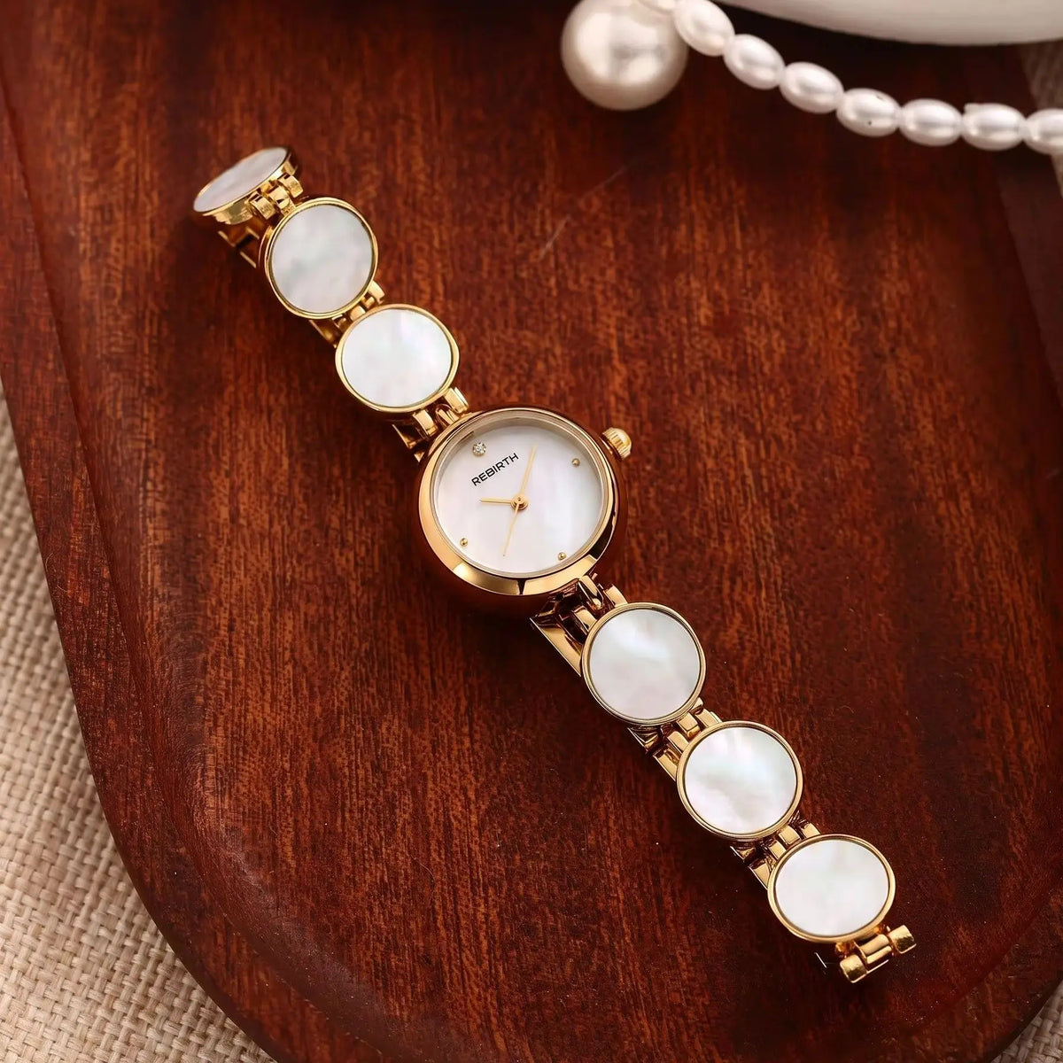 REBIRTH Women's Quartz Watch | Mother-of-Pearl & Diamond Dial Women's Quartz Watch Nixie