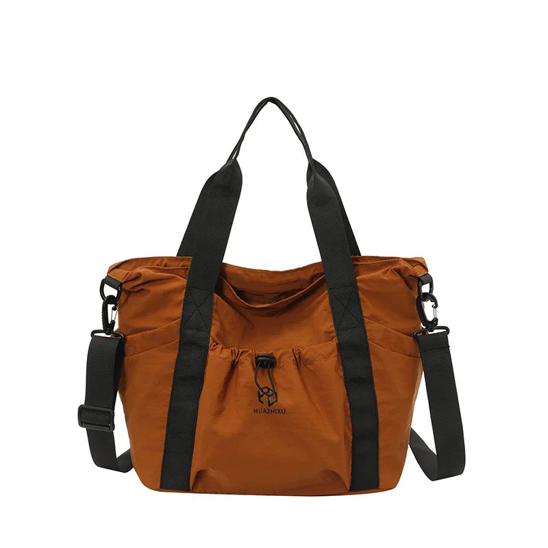 Nixie Nylon Crossbody Gym Bag – Travel & Sport Tote for Women Crossbody Tote Bag Nixie Orange