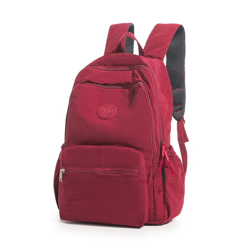 Nixie Lightweight Waterproof Travel Backpack – Unisex 20–35L