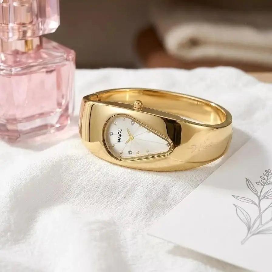 Naidu Women's Gold Bracelet Quartz Watch – Elegant Bangle Style Bracelet Quartz Watch Nixie