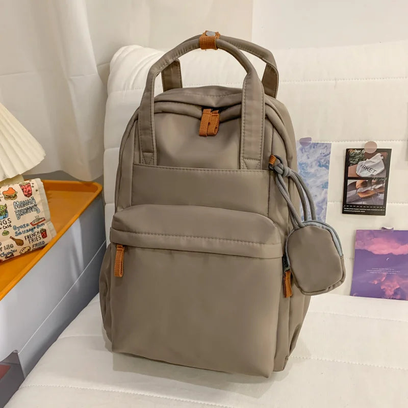 Nixie Lightweight Nylon Backpack – Laptop, Travel & Commute Lightweight Backpack Nixie