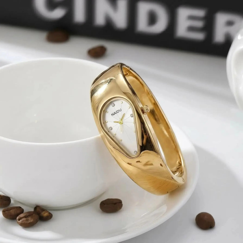 Naidu Women's Gold Bracelet Quartz Watch – Elegant Bangle Style Bracelet Quartz Watch Nixie