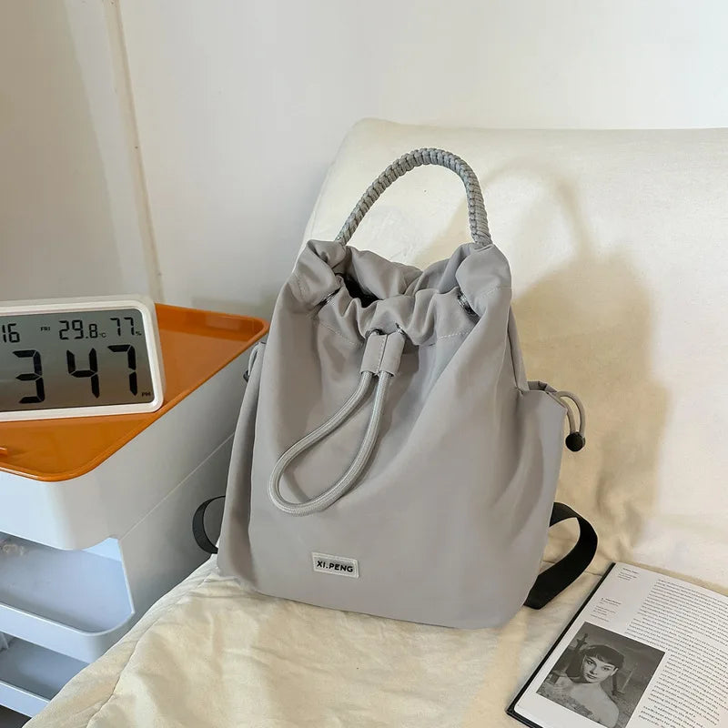 Nixie Large Canvas Drawstring Backpack – Women's Travel Tote Canvas Drawstring Backpack Nixie
