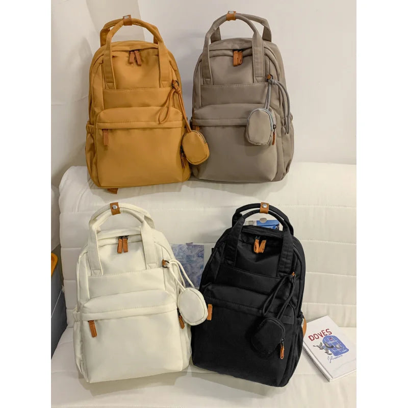 Nixie Lightweight Nylon Backpack – Laptop, Travel & Commute Lightweight Backpack Nixie