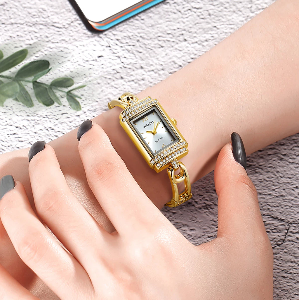 Women's Rhinestone Quartz Watch – White Dial Luxury Style Women's Quartz Watch Nixie